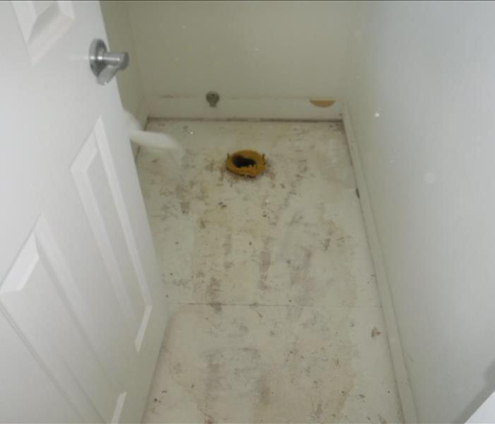 Removed tile and exposed flooring